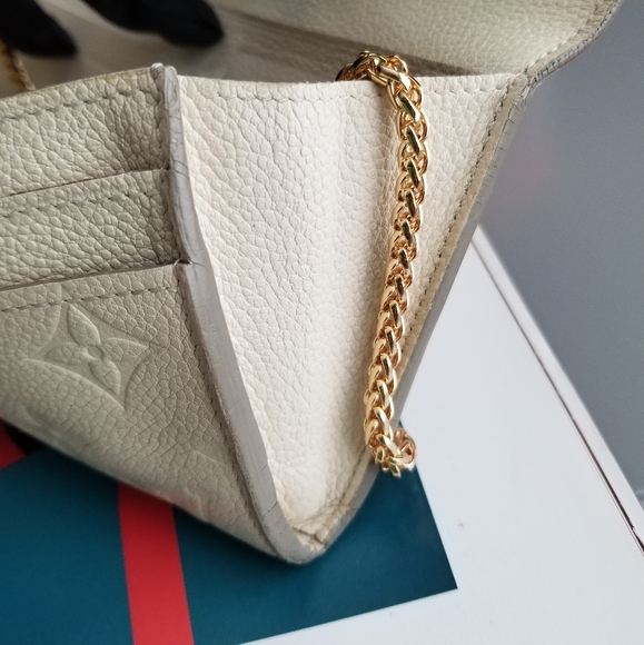 LOUIS VUITTON Portefeuille Empreinte Neige Mono - Picture 13 of 16